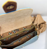 Elegant Lucy handbag crafted from upcycled real leather, combining sustainability with timeless style