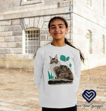Brown cat wearing a comfortable long sleeve shirt, showcasing casual and stylish apparel for everyday wear.