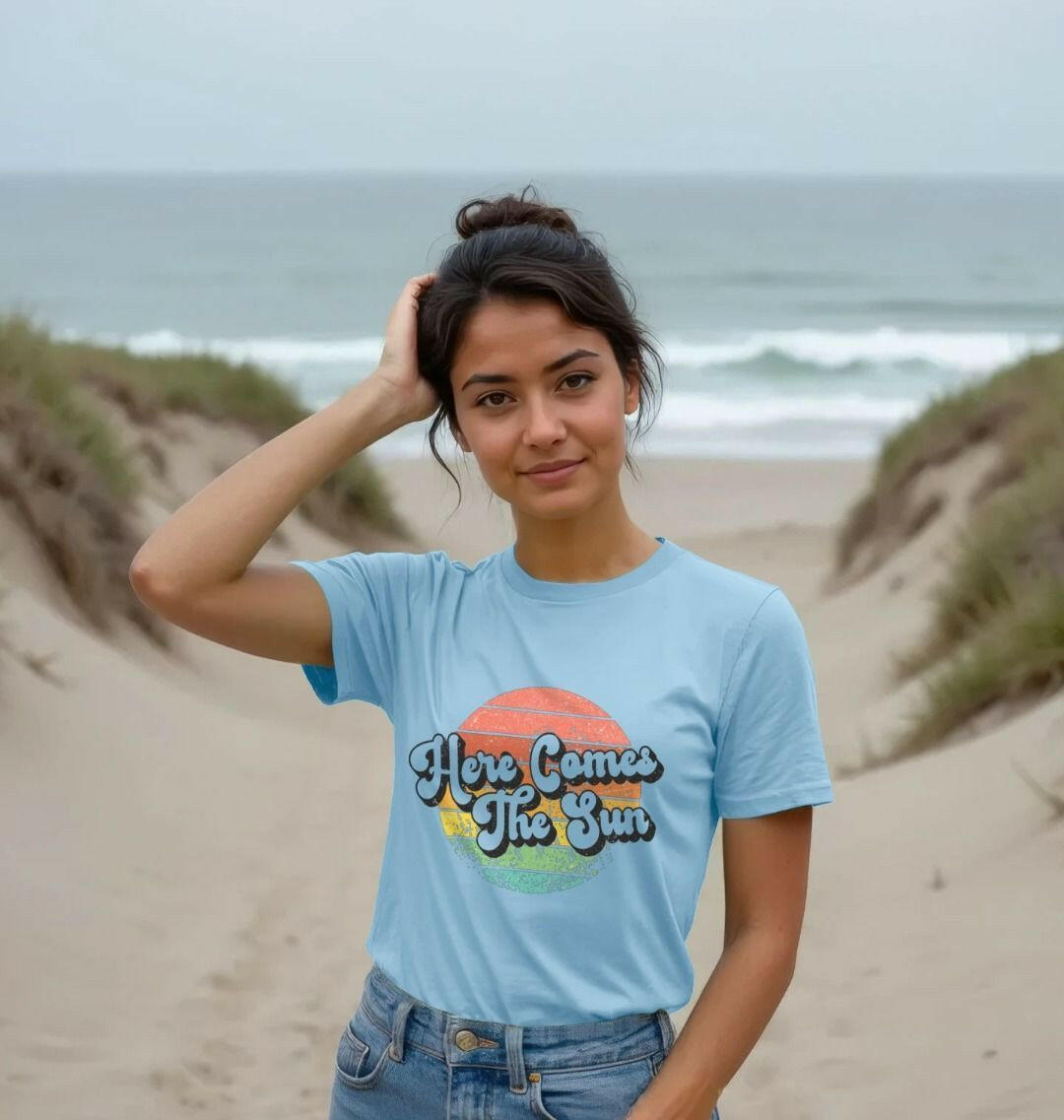 Sun shining brightly over a women's organic cotton t-shirt, highlighting sustainable fashion and eco-friendly apparel