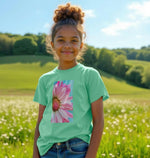 Elegant pink flower tee featuring vibrant floral design, perfect for stylish spring and summer outfits.