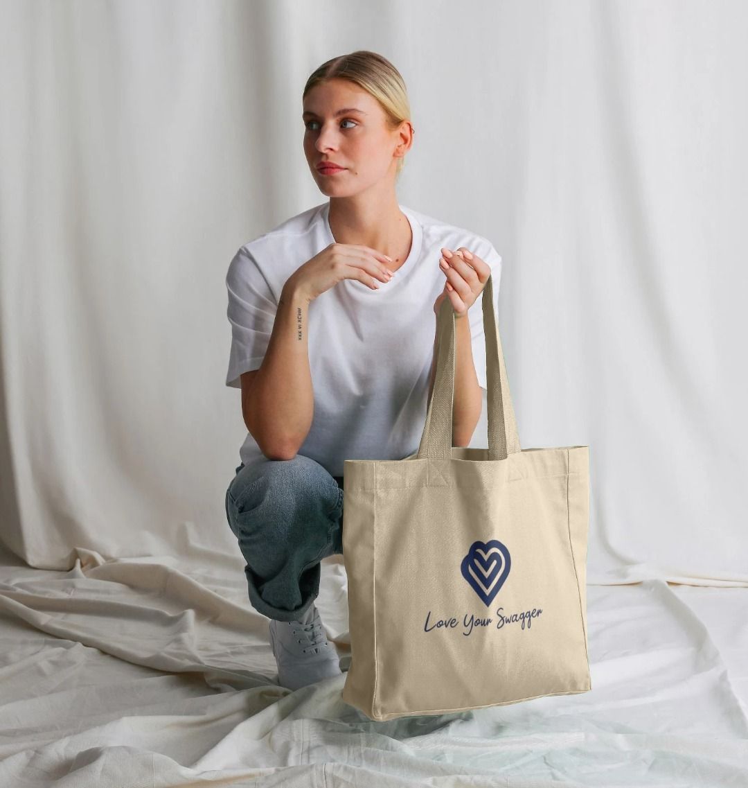 Elegant shopper showcasing love and swagger in stylish fashion accessories for a sophisticated look.