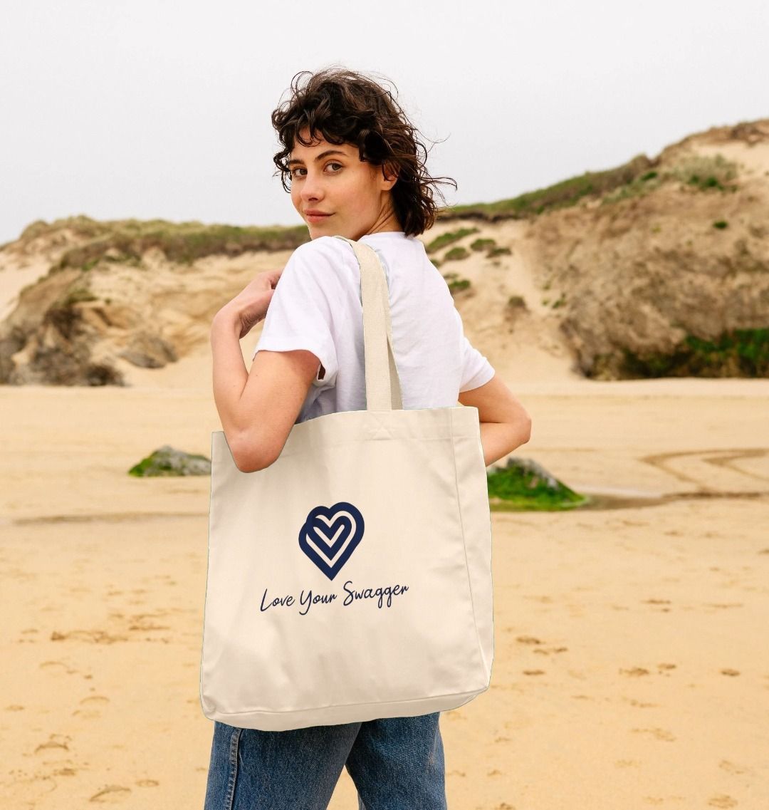 Elegant shopper showcasing love and swagger in stylish fashion accessories for a sophisticated look.